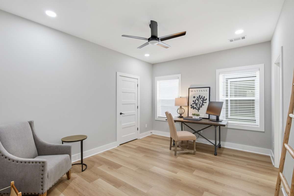 Bedroom 3 - currently staged as a home office - offers yet another spacious and versatile room for future homeowners.
