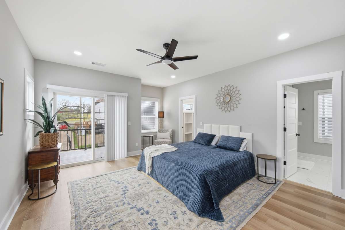 Luxurious primary retreat. Spacious and inviting, this suite has a full bathroom, private walk-out balcony, full walk-in closet (with built-ins), and a second closet as well!