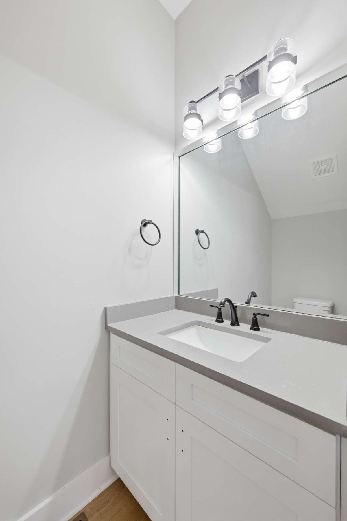 Powder bath conveniently located on the main level.