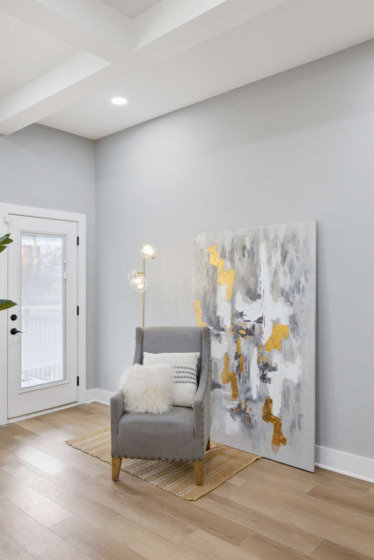 Your rear entrance steps out onto your covered outdoor living and fenced backyard!