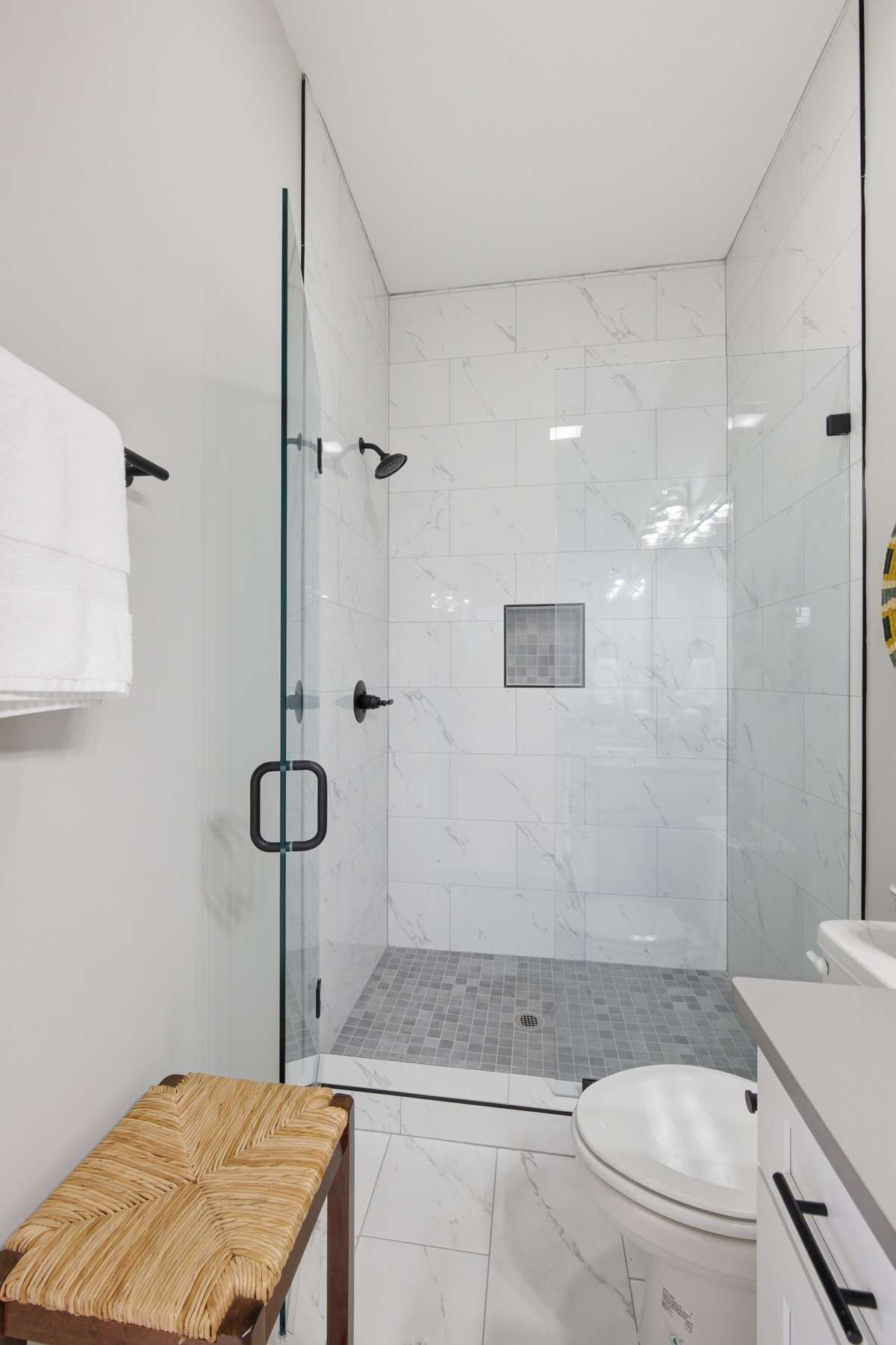 Look at the detail, including the rain rock floor and shower niche!