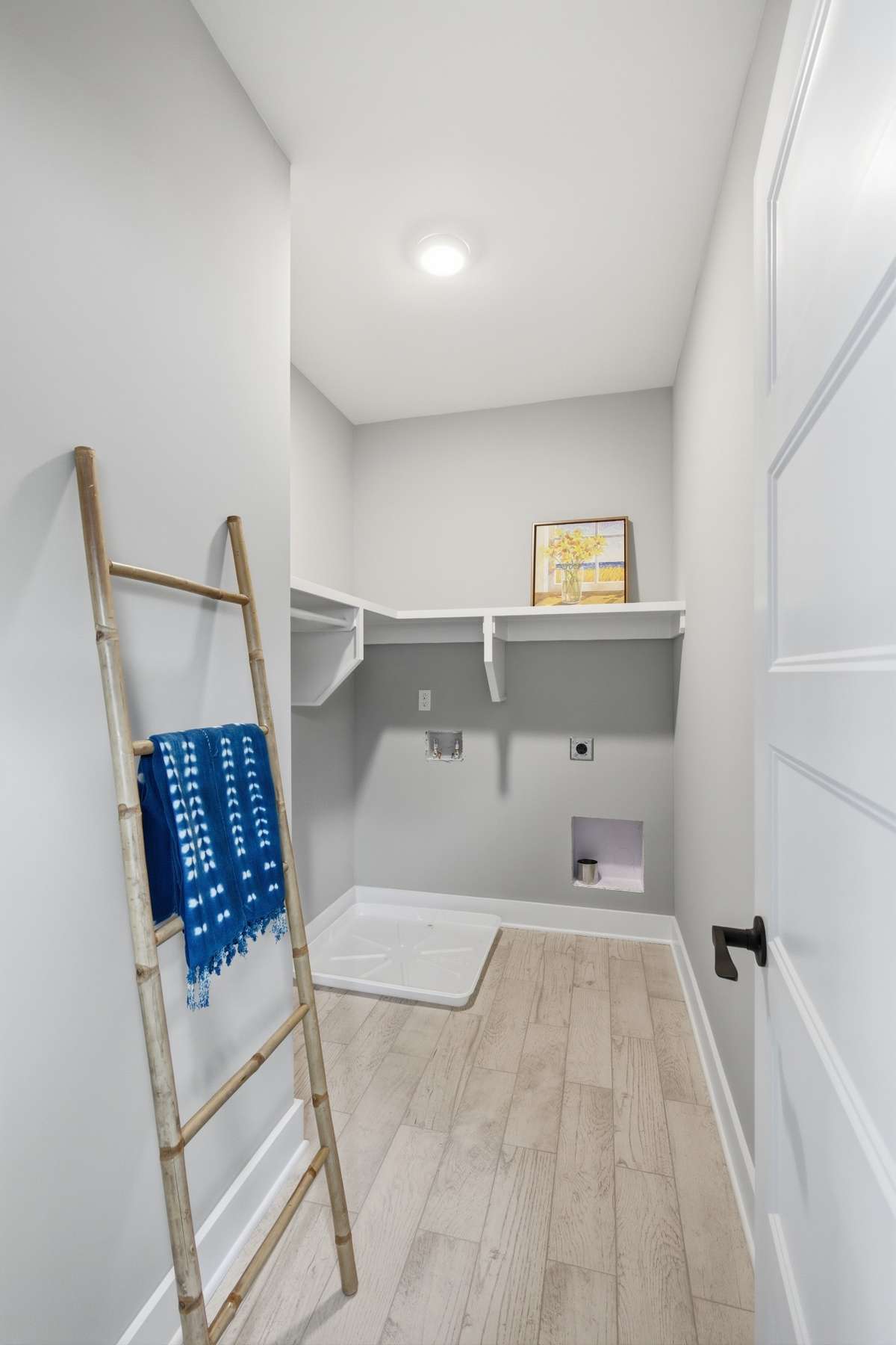 Your utility/laundry room is conveniently located on the upper level near your primary bedroom.