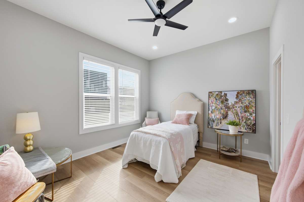 Bedroom 4 - located on the main level, this bedroom is ideal for in-laws, guests, or could be utilized as a home office on the main.