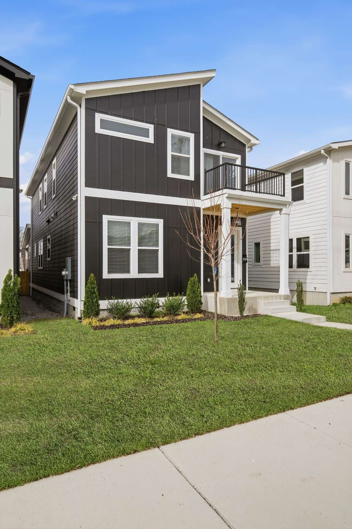 Level, beautiful yard with new landscaping surrounds this home.
