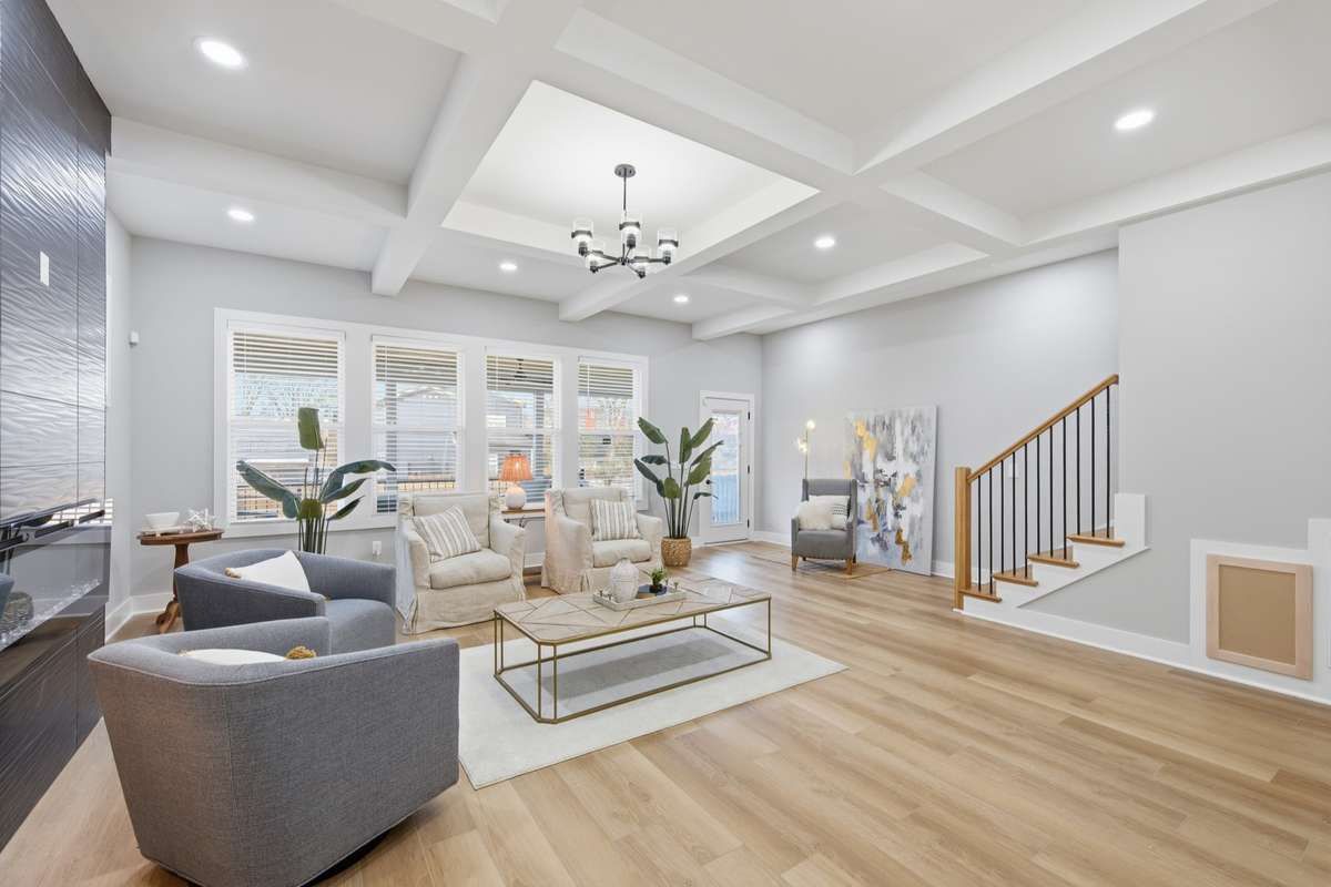 This expansive space is uniquely complimented by a floor-to-ceiling modern fireplace.