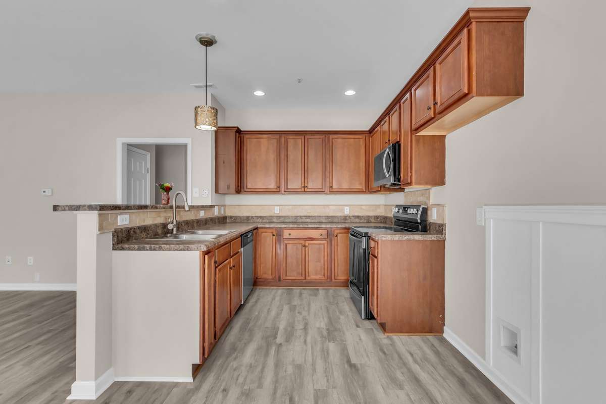 Stainless Steel Appliances included: Microwave, Dishwasher, Smooth-Top Range/Oven