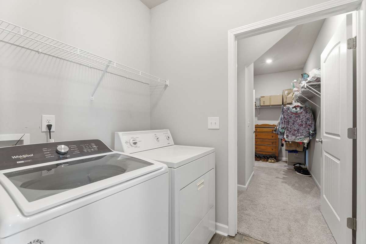 Laundry Room that connects to the Master bedroom closet