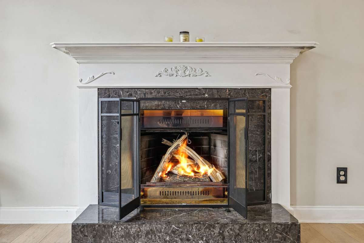 Focal point in the living room with a raised hearth and classic mantel! 7701 Poplar Ridge Drive, Nashville, TN 37221