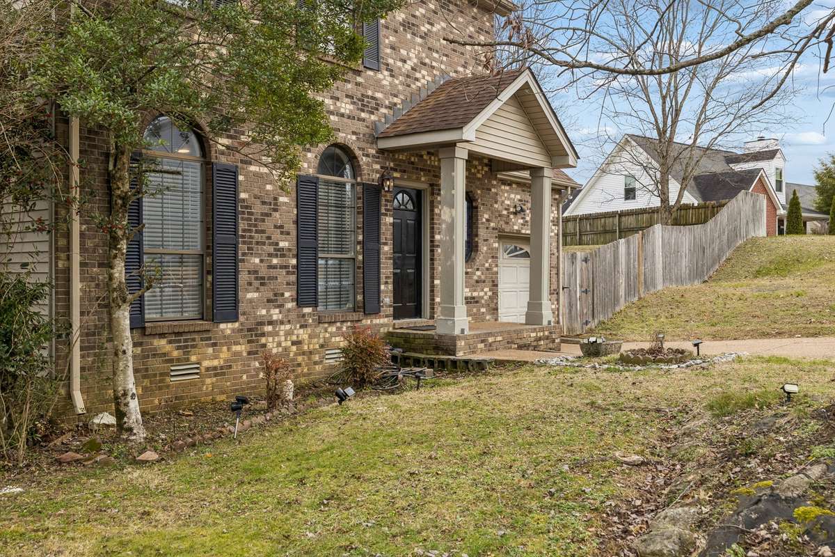Full brick home with covered front porch to greet guests! 7701 Poplar Ridge Drive, Nashville, TN 37221