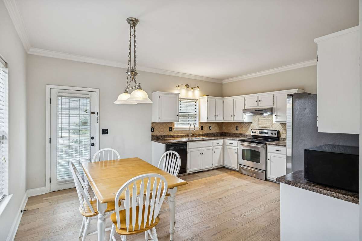 Generously sized kitchen features new flooring and an abundance of cabinetry! 7701 Poplar Ridge Drive, Nashville, TN 37221