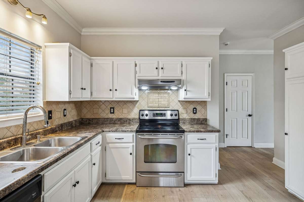 Stainless appliances, new faucet, and tile backsplash!  7701 Poplar Ridge Drive, Nashville, TN 37221