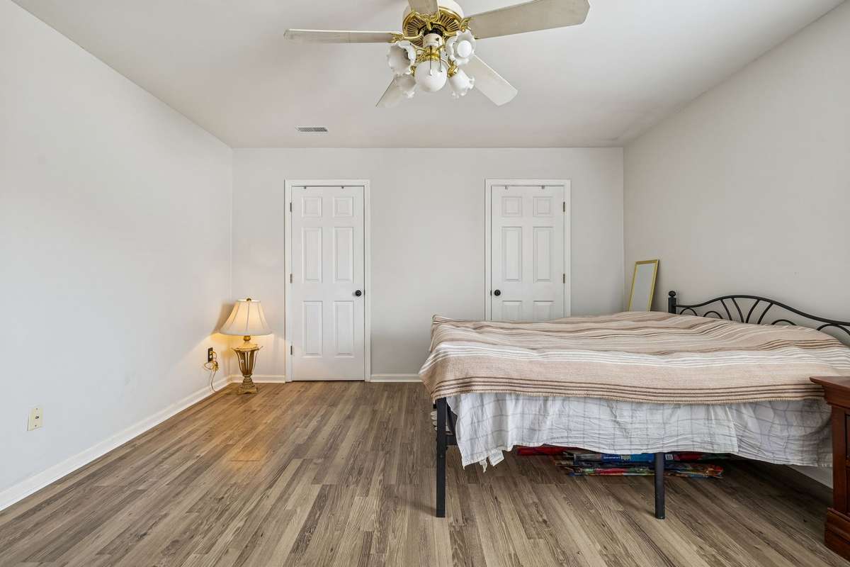 Primary bedroom has two closets, fresh paint, and ceiling fan! 7701 Poplar Ridge Drive, Nashville, TN 37221