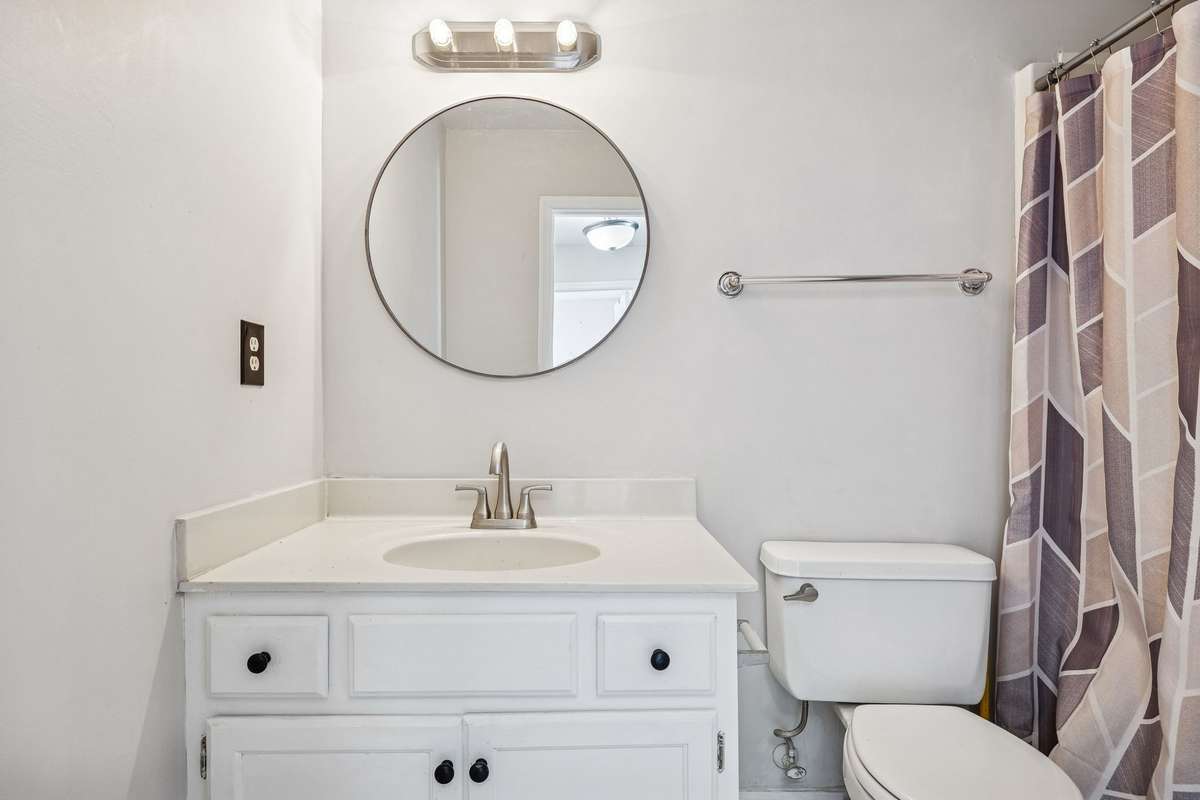 Second bathroom upstairs is bright and clean with lovely fixtures and new hardware! 7701 Poplar Ridge Drive, Nashville, TN 37221