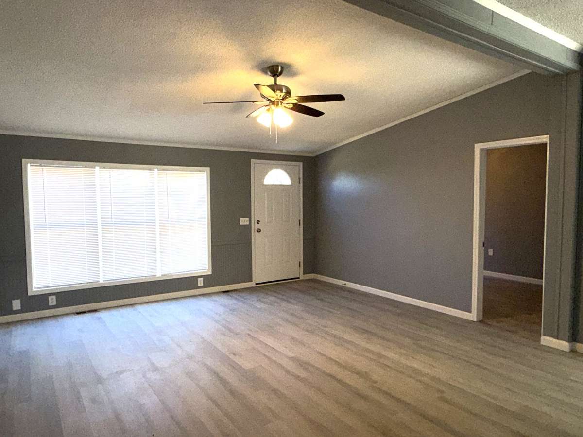 open floor plan - vaulted ceiling- new luxury vinyl flooring