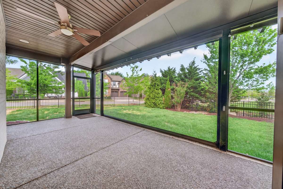 The screened patio offers a comfortable outdoor space to relax and enjoy fresh air with a relaxed setting for lounging or entertaining