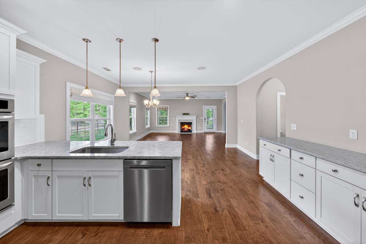 From here, you can see the additional counterspace added in the kitchen on the right side  of the room beside a walk-in.