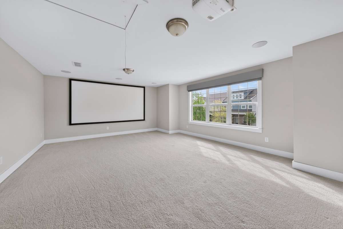 The bonus room is perfect for movie nights and game nights, offering a versatile space for relaxation and entertainment.