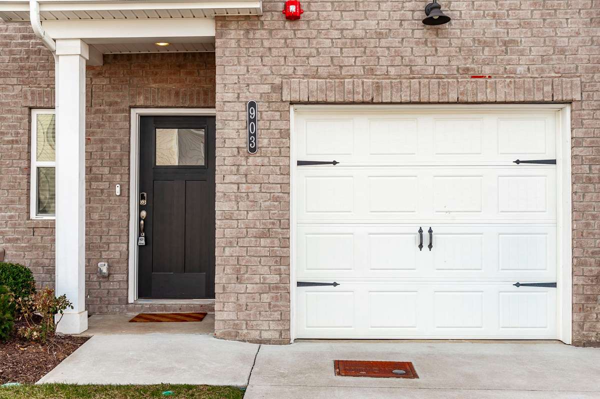 One car attached garage with pull down staircase for attic storage
