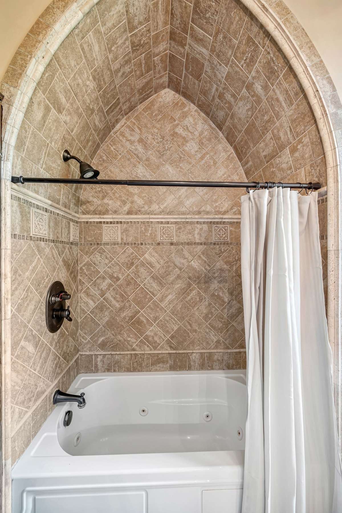 arched shower/ bath combo