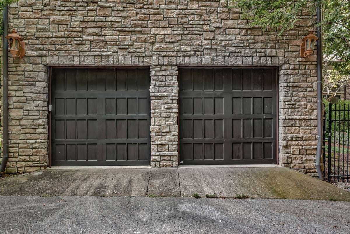 2 car garage off the kitchen. Entry to garage is on (side street) East Brookfield not Belle Meade Blvd