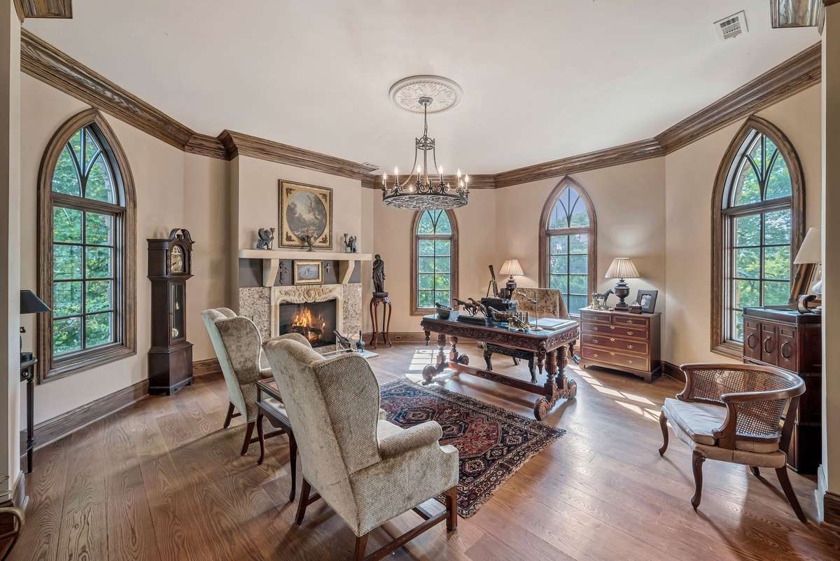 Office in the turret on the second floor with arched windows