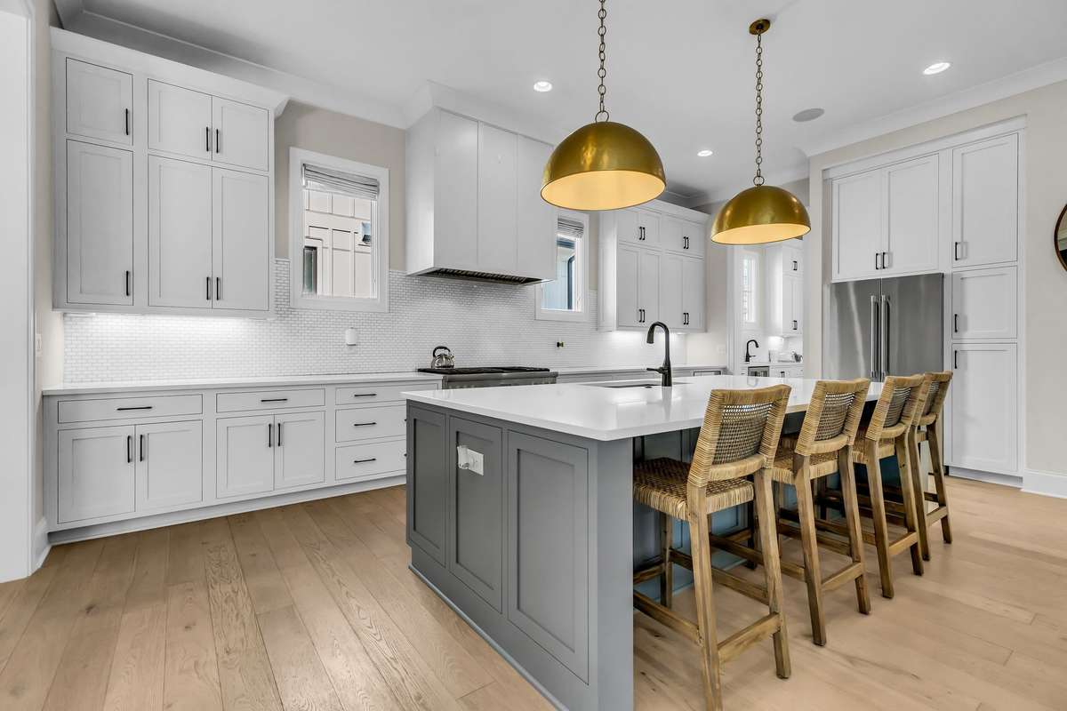 Chef's kitchen with gas range.