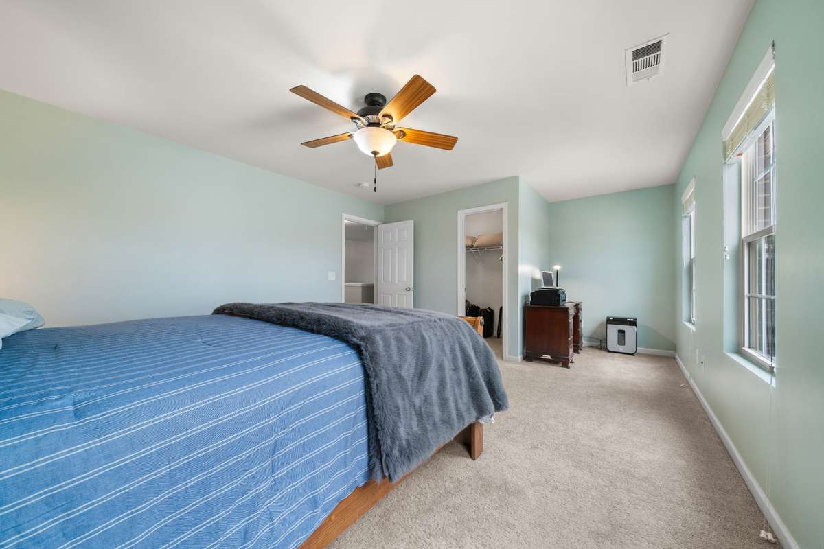 Bedroom 3: This room features a nook on the opposite side of the room.