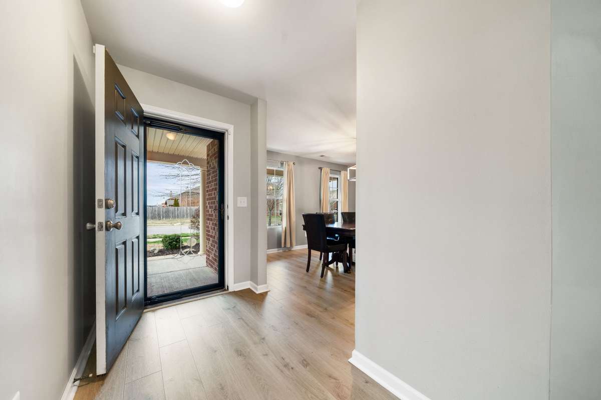 Front Door and leading into the dining room.
