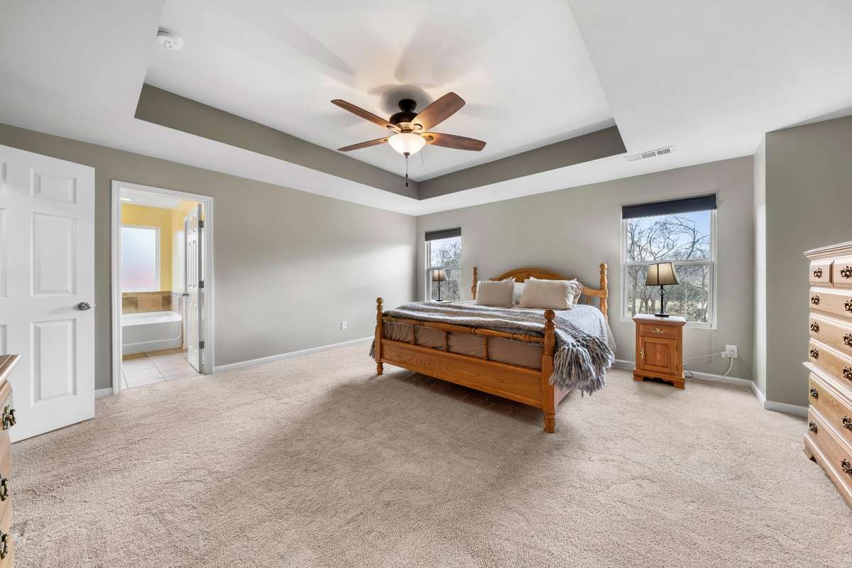 Luxurious Primary bedroom with lots of character.