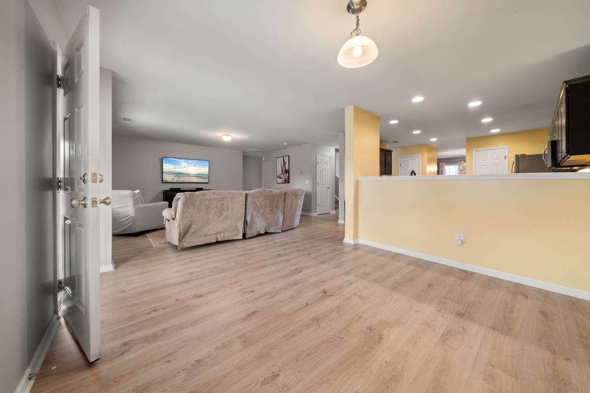 From the breakfast nook, the living room can be seen.