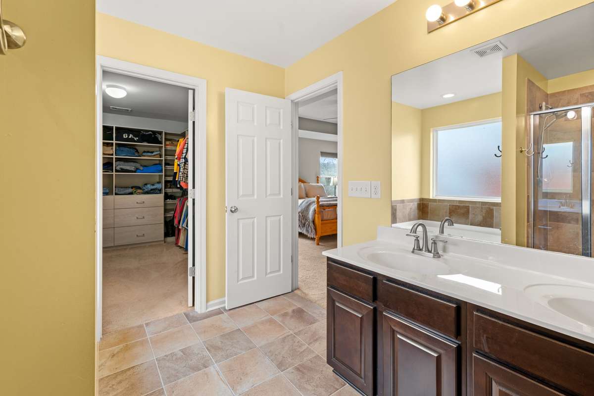 Primary Bathroom: The Walk-in Closet is inside the Primary Bathroom.