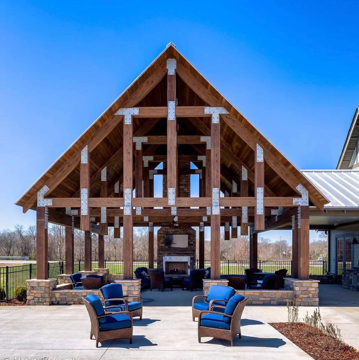 Adjacent to the clubhouse is this lovely outdoor pavilion with gas, burning fireplace and seating. A beautiful place to gather and enjoy the evening sunsets.