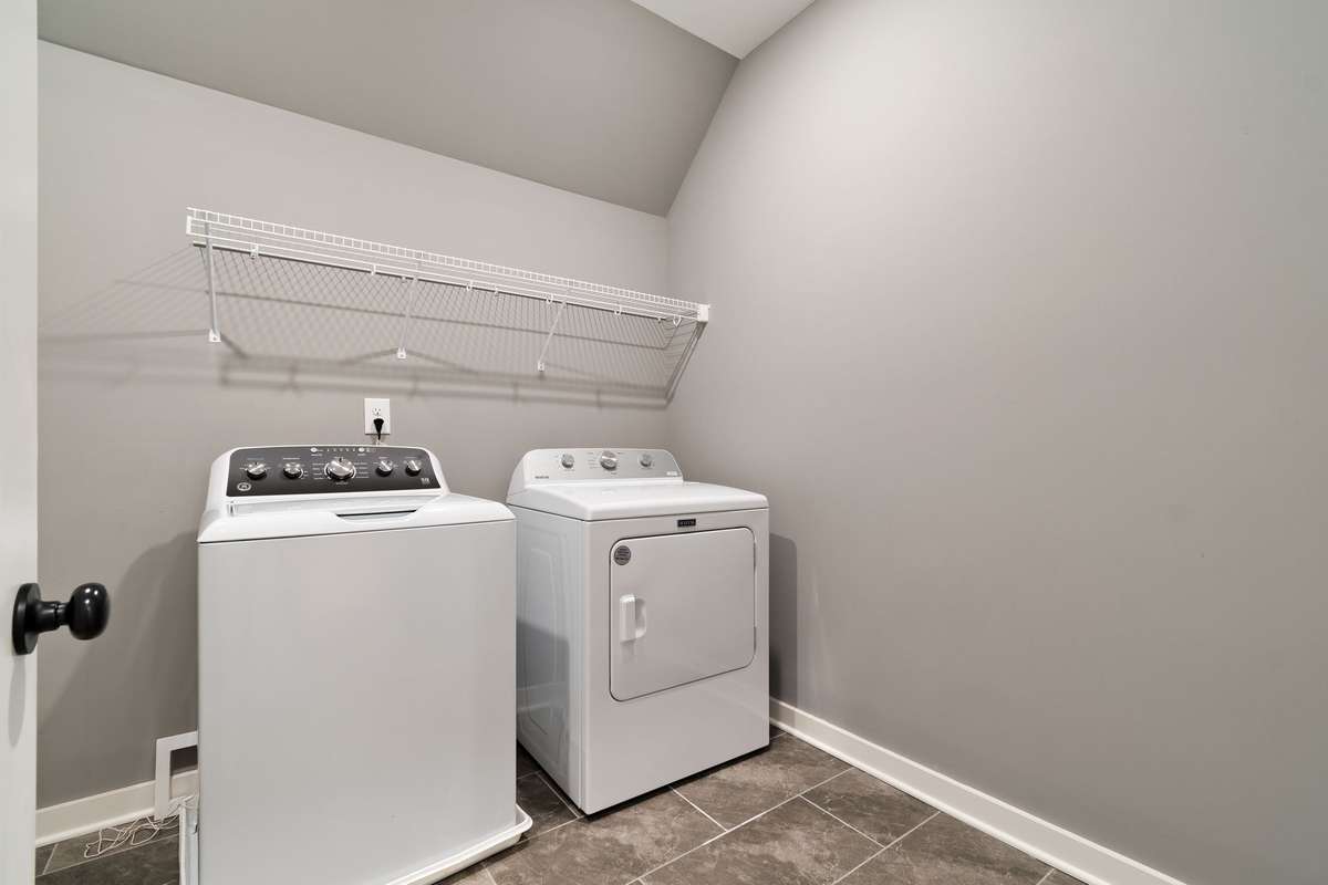 Newer washer and dryer remain.