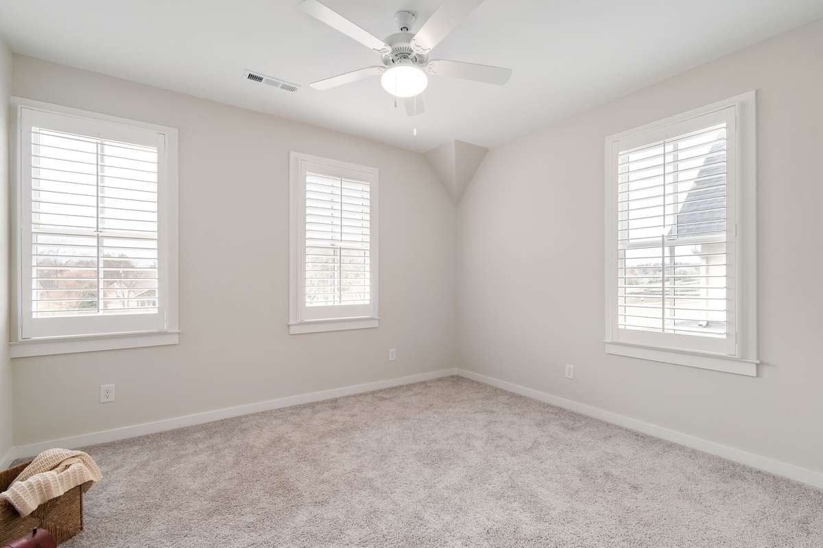 This third bedroom also has two walls of windows.