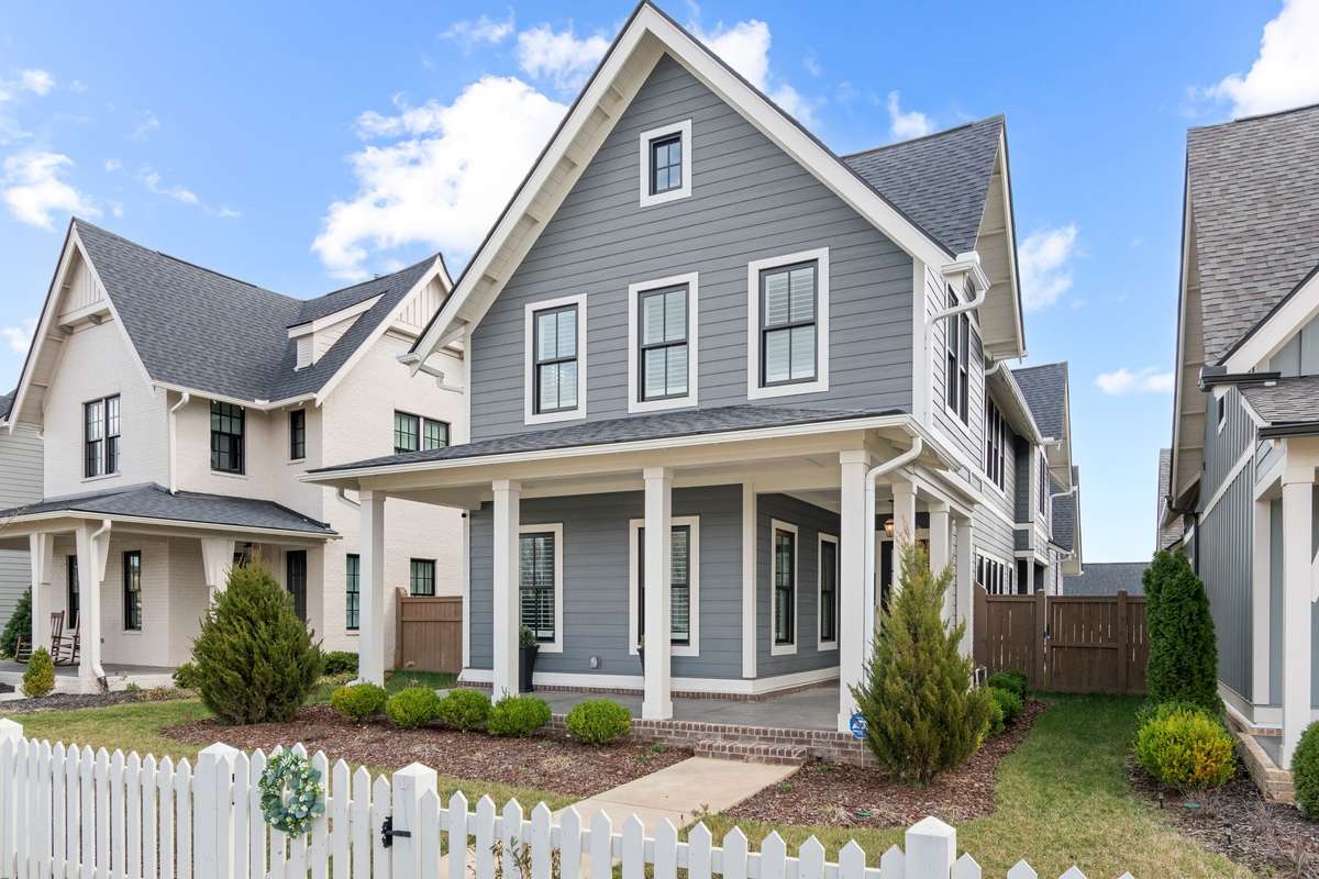 How beautiful is this home?  It’s inviting in every way and the picket fence is the icing on the cake!