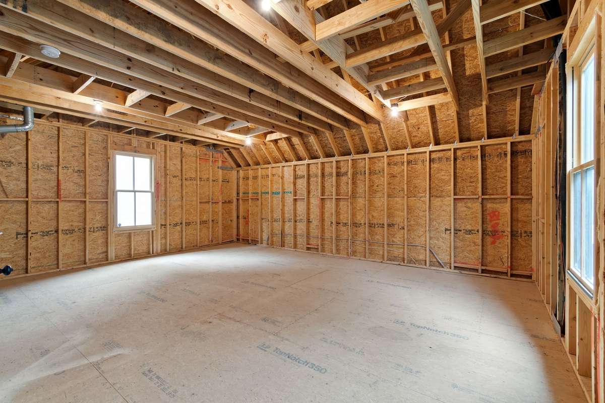 Above the two car garage is this: the enormous expansion opportunity. Perfect for a rec room or separate office space or a future mother-in-law suite with its own set of stairs at the back of the house.