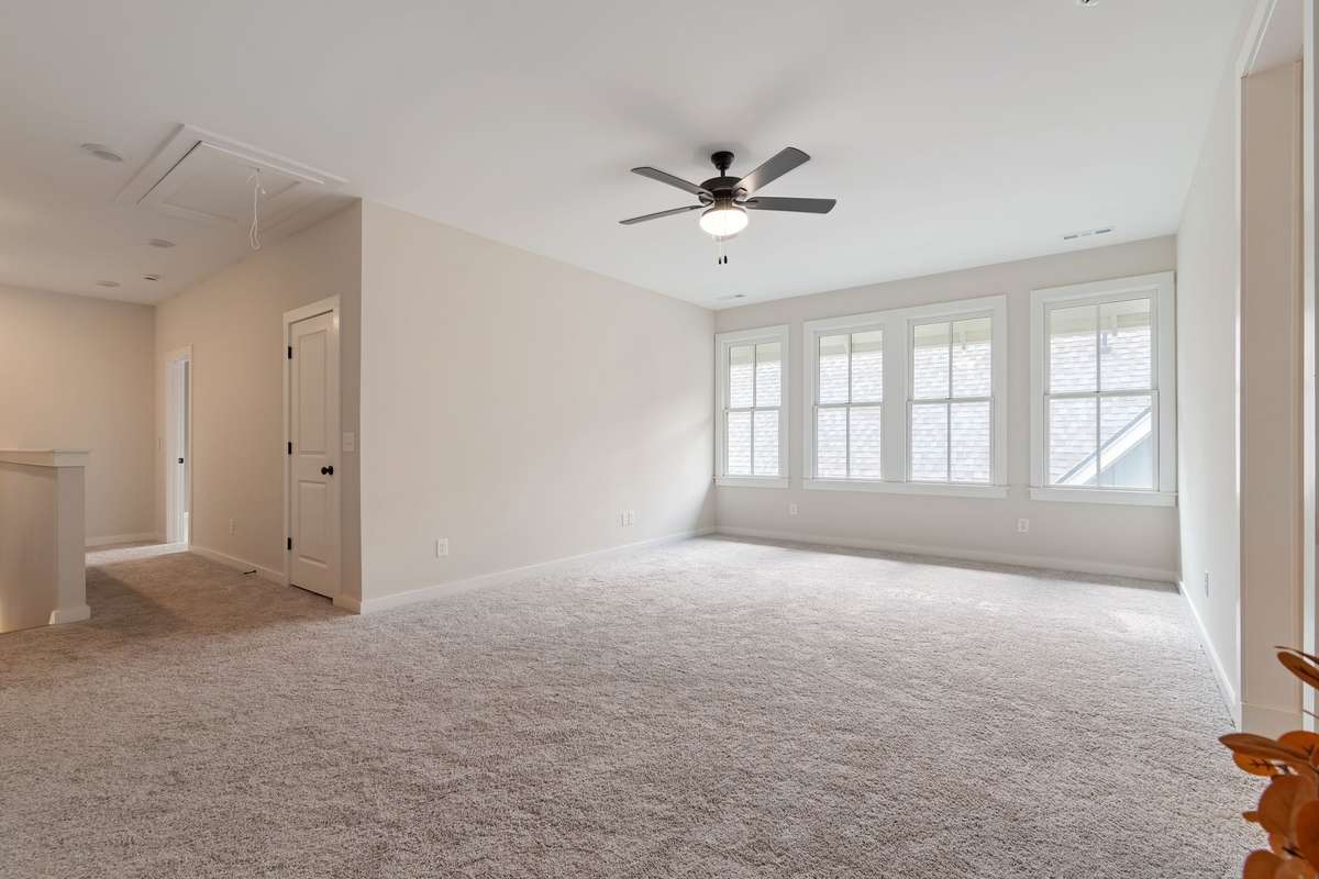 The second floor has a large upstairs den.