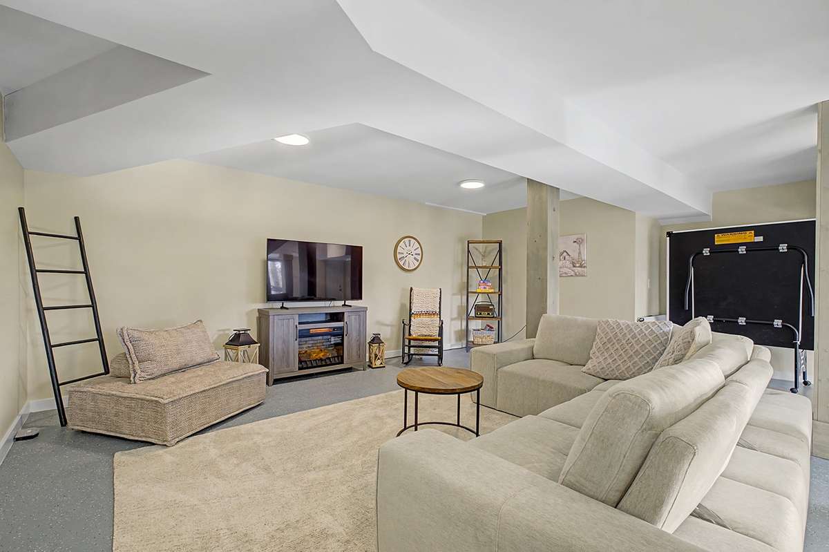 Spacious wraparound family/rec room/flex space