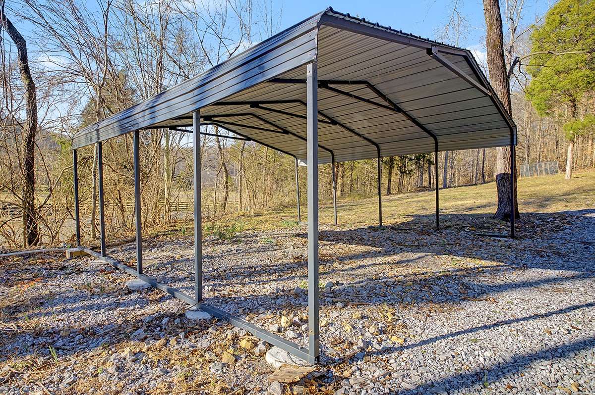 Added carport + driveway for resident and guest parking