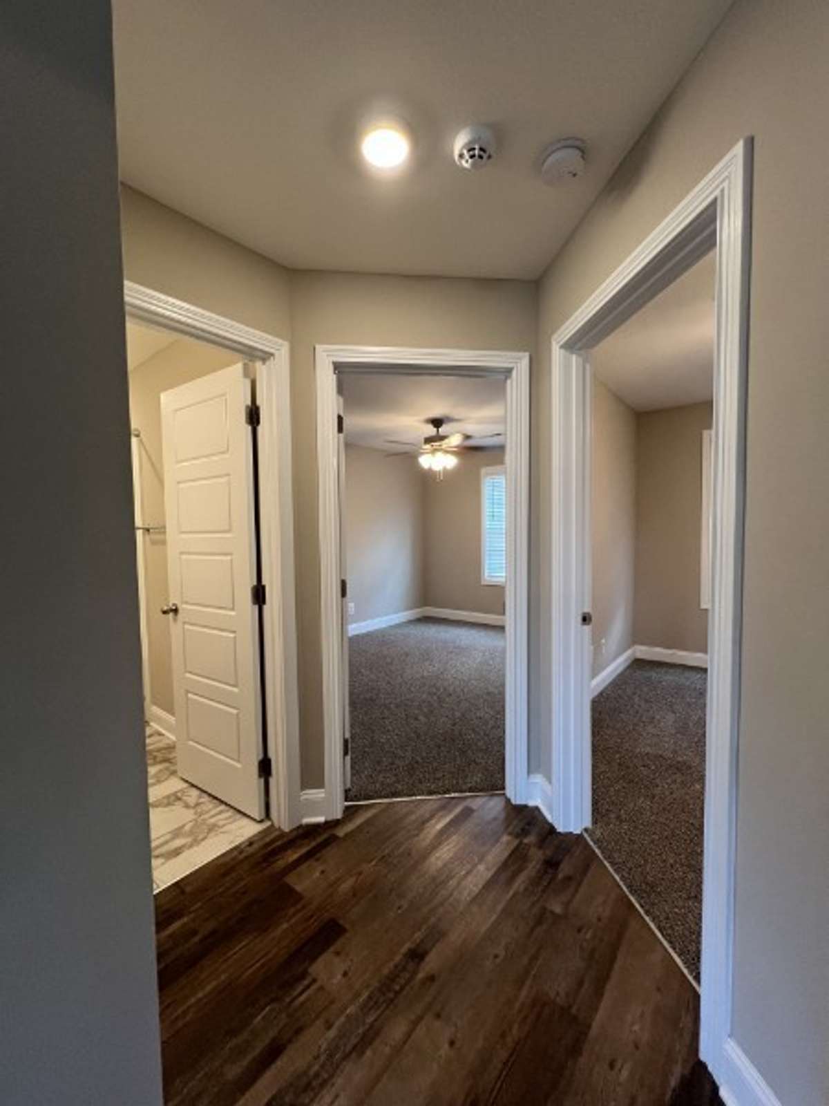 Hallway leading to the guest rooms & hall bath.