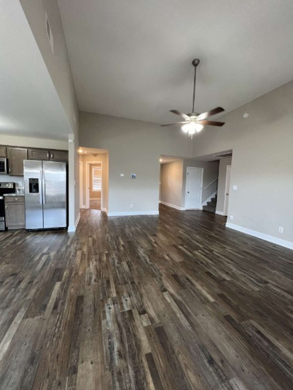 Beautiful flooring & tall ceilings in the living room make this an exceptional space.