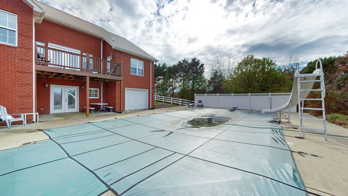 Utility garage perfect to store ATV's, bicycles, pool toys, and much more!