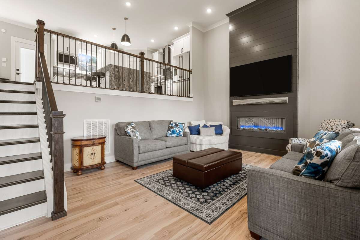 Living room with electric fireplace.