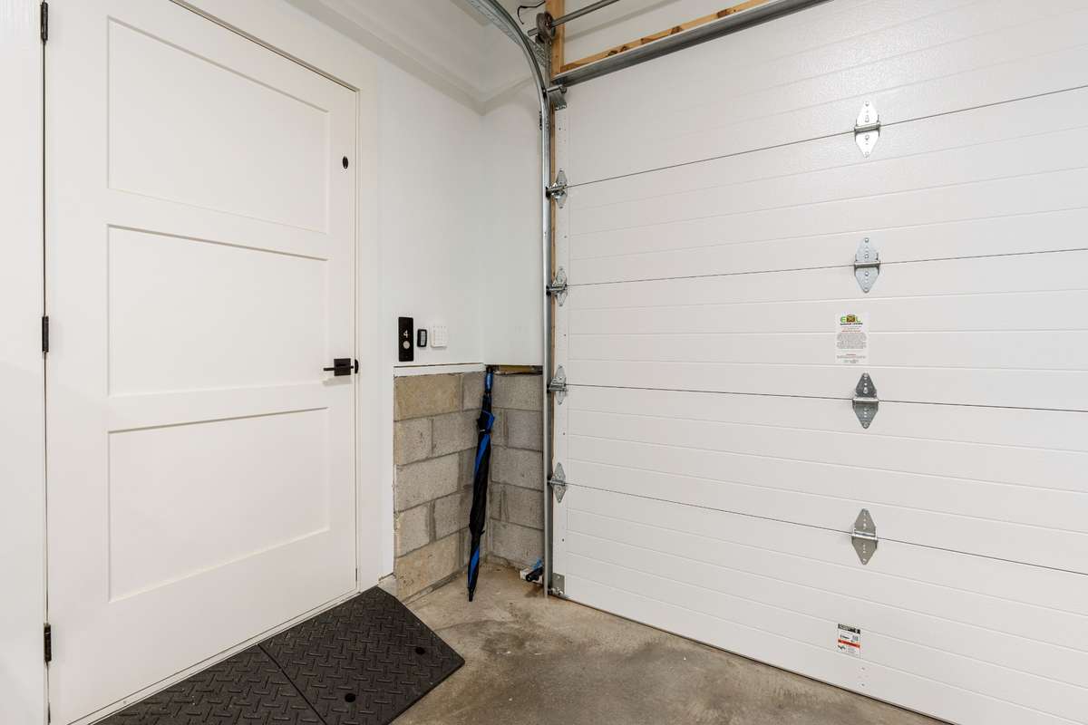 Entry to elevator from garage.  Ramp remains with the home.