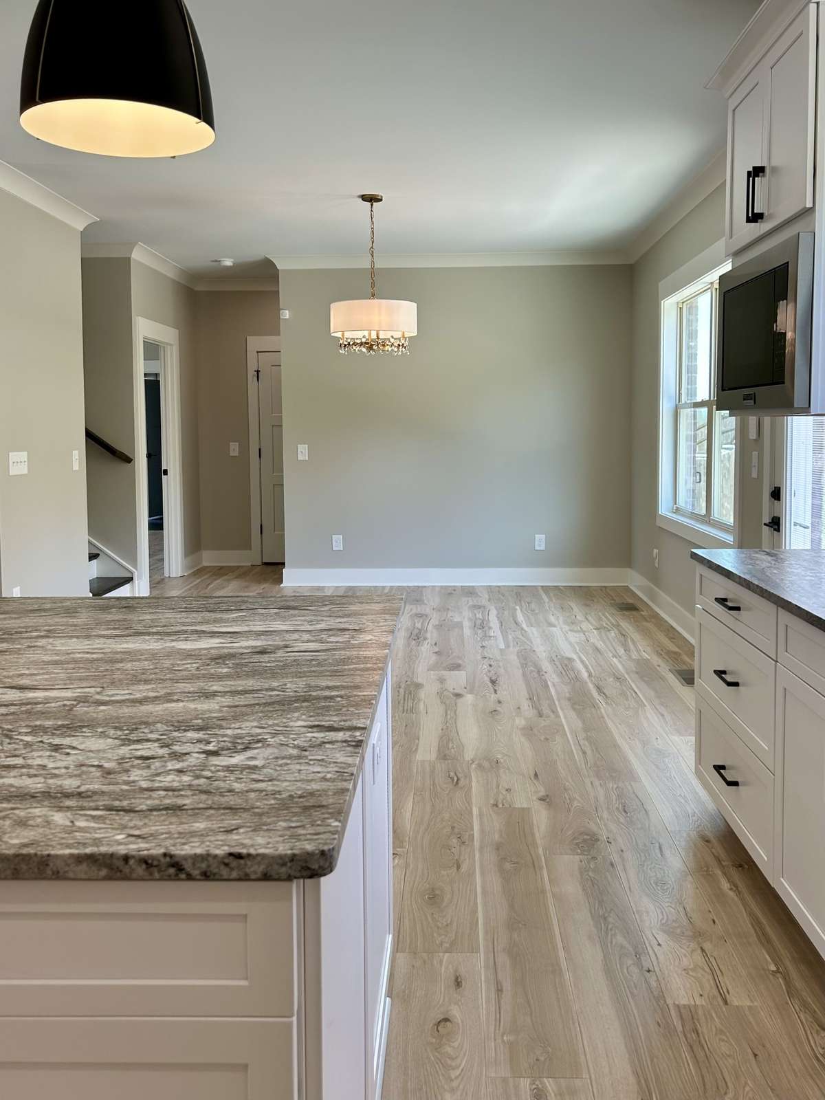 Oversized dining room open to kitchen.