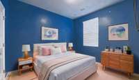 This Bedroom is located on the Main Floor- virtually staged