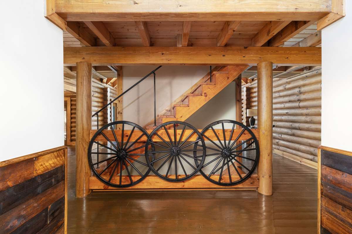 Foyer and stairs leading to the second floor and basement