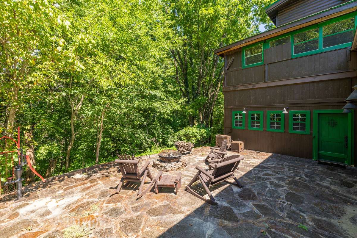 Back patio - includes outdoor furniture and enclosed fire pit - ready to make memories and roast marshmallows