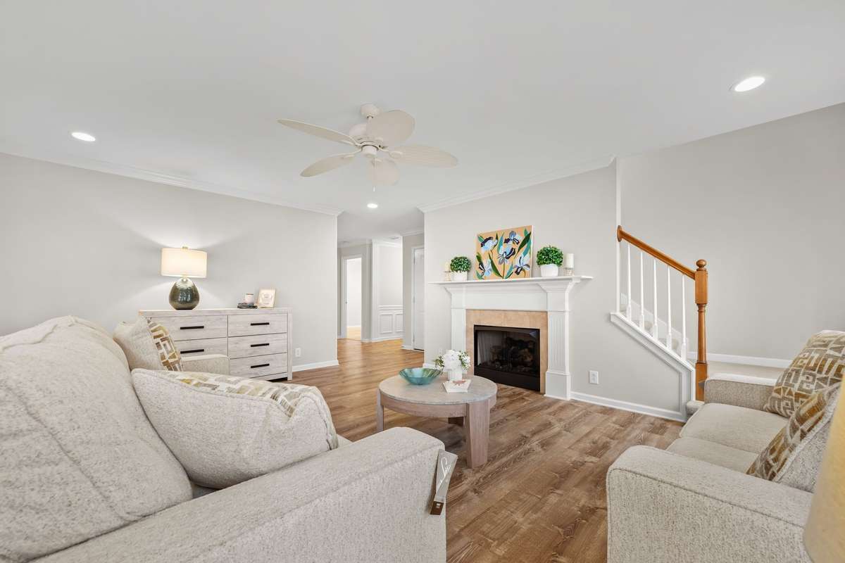 Another view of the great room showing the stairs leading to the bonus space on second floor.