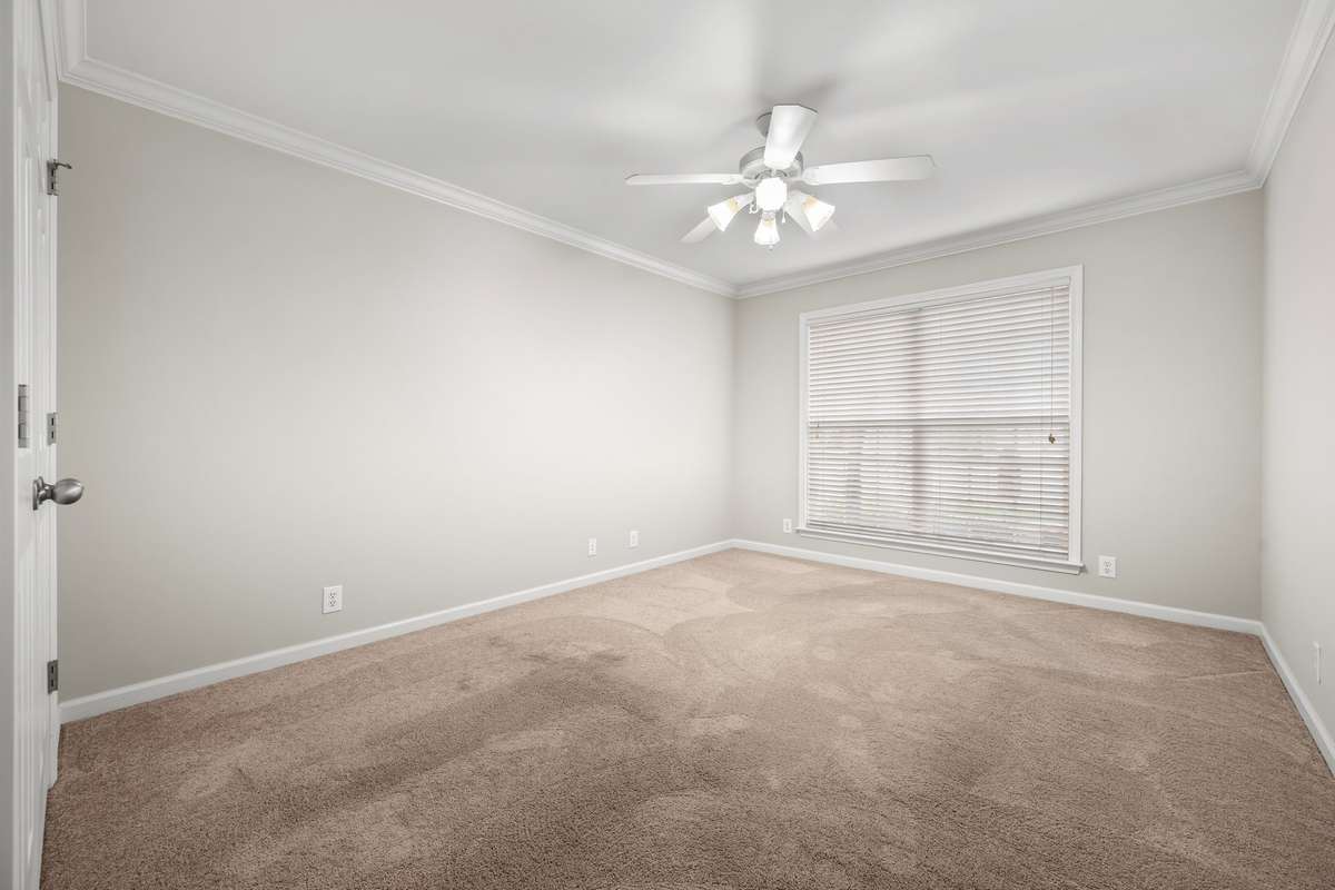 Second bedroom with large closet sits on front of house.  Set it up to welcome your guests.